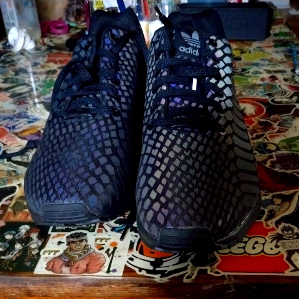 Adidas size 11( change is color with light)